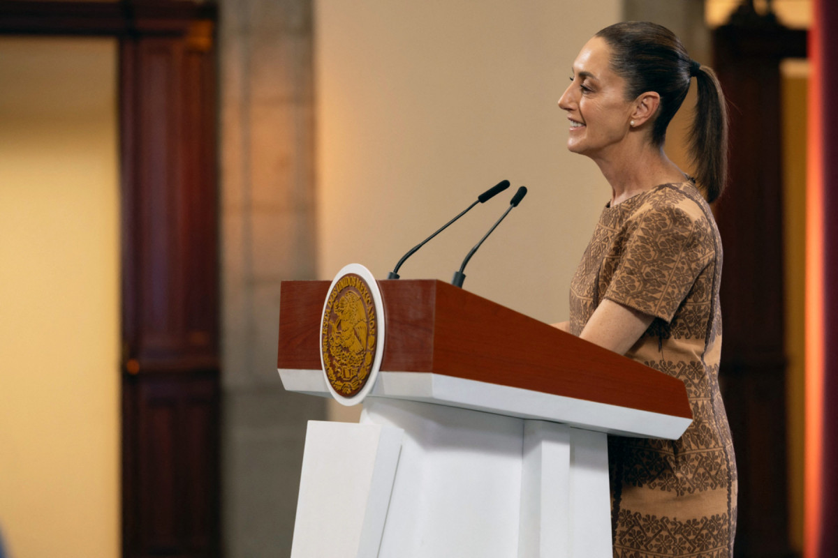  Handout picture released by the Mexican Presidency shows Mexico's President Claudia Sheinbaum smiling during her daily press conference at the National Palace in Mexico City on May 09, 2025. Mexico has sued Google for changing the Gulf of Mexico's name to 