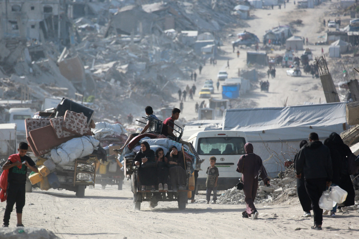 Palestinos deixando o norte da Faixa de Gaza após ordens israelenses para evacuação. Foto: Bashar TALEB / AFP