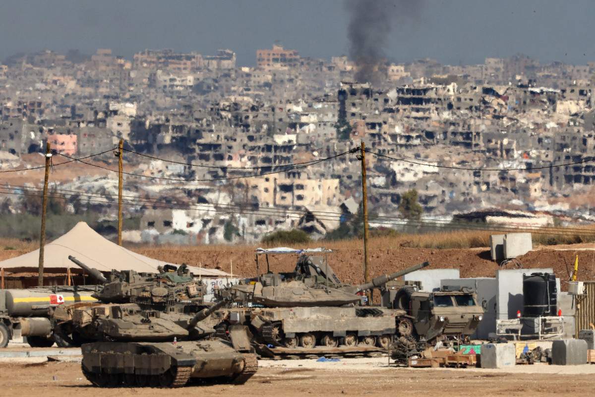  Israeli troops deploy at a position by Israel's border with the Gaza Strip on May 20, 2025. Israel's military has announced the expansion of its operations, saying it is aimed at 