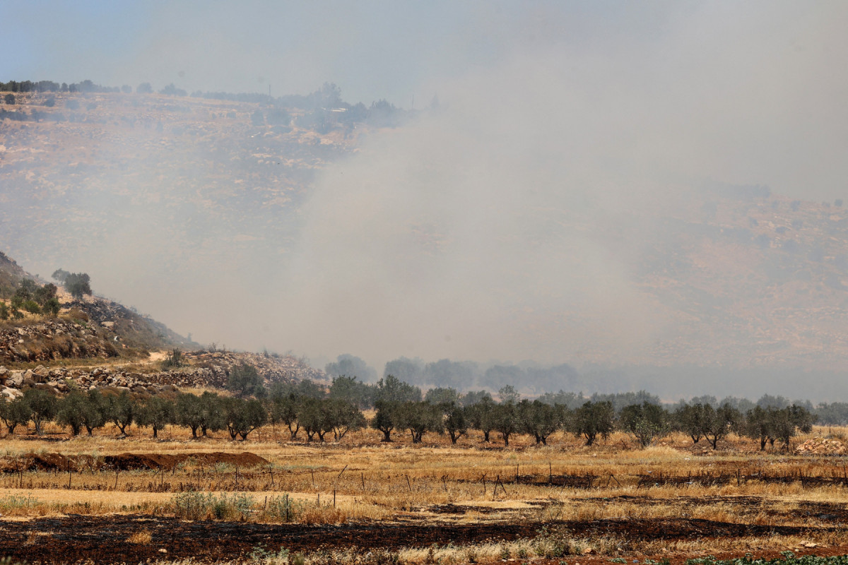 A aldeia palestina de Khirbet Abu Falah foi incendiada por colonos (ZAIN JAAFAR/AFP)
A aldeia palestina de Khirbet Abu Falah foi incendiada por colonos/ZAIN JAAFAR/AFP