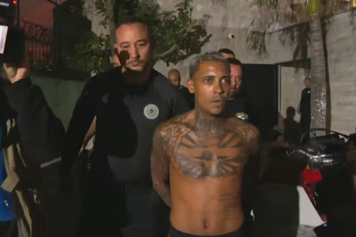 MC Poze do Rodo é preso por suspeita de envolvimento com o tráfico. (Foto: Reprodução/TV Globo) MC Poze do Rodo é preso por suspeita de envolvimento com o tráfico./Foto: Reprodução/TV Globo