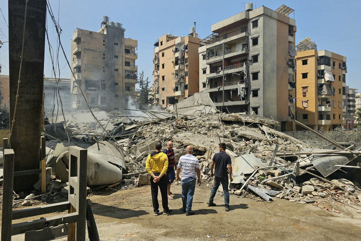 Prédio desabado no local de um ataque aéreo israelense /AFP