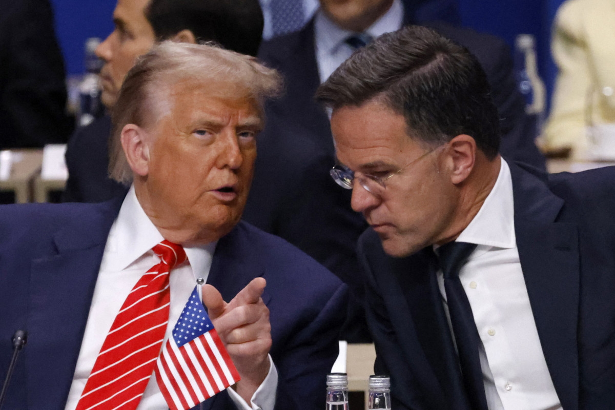 O presidente dos EUA, Donald Trump (E), fala com o secretário-geral da OTAN, Mark Rutte, durante a reunião plenária do Conselho do Atlântico Norte na cúpula da Organização do Tratado do Atlântico Norte (OTAN), em Haia, em 25 de junho de 2025. (Foto de Ludovic MARIN / POOL / AFP) ( AFP) O presidente dos EUA, Donald Trump (E), fala com o secretário-geral da OTAN, Mark Rutte, durante a reunião plenária do Conselho do Atlântico Norte na cúpula da Organização do Tratado do Atlântico Norte (OTAN), em Haia, em 25 de junho de 2025. (Foto de Ludovic MARIN / POOL / AFP)/ AFP