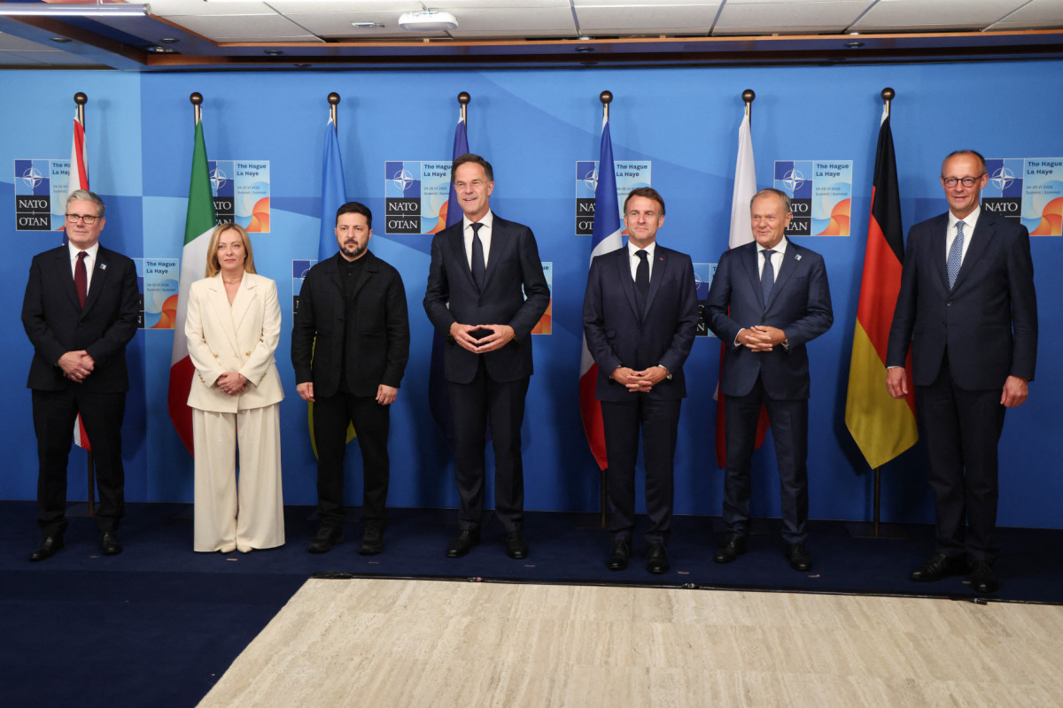  (From L) Britain's Prime Minister Keir Starmer, Italy's Prime Minister Giorgia Meloni, Ukraine's President Volodymyr Zelensky, NATO Secretary General Mark Rutte, France's President Emmanuel Macron, Poland's Prime Minister Donald Tusk and Germany's Chancellor Friedrich Merz pose within a meeting between the NATO Secretary General, the president of Ukraine, and leaders of E5 countries during a North Atlantic Treaty Organization (NATO) Heads of State and Government summit in The Hague on June 25, 2025. 