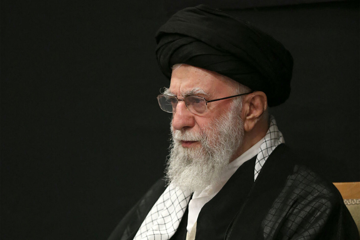 This handout picture released by the office of Iran's Supreme Leader Ayatollah Ali Khamenei on July 5, 2025 shows him attending a mourning ceremony in Tehran marking the ninth day of the Islamic month of Muharram in the lead-up to Ashura, a 10-day period commemorating the seventh century killing of Prophet Mohammed's grandson Imam Hussein. Iran's supreme leader on July 5 made his first public appearance since the outbreak of his country's recent 12-day war with Israel, state media reported, greeting worshippers and being cheered at a mosque in a video broadcast by state television. (AFP PHOTO / HO / KHAMENEI.IR) This handout picture released by the office of Iran's Supreme Leader Ayatollah Ali Khamenei on July 5, 2025 shows him attending a mourning ceremony in Tehran marking the ninth day of the Islamic month of Muharram in the lead-up to Ashura, a 10-day period commemorating the seventh century killing of Prophet Mohammed's grandson Imam Hussein. Iran's supreme leader on July 5 made his first public appearance since the outbreak of his country's recent 12-day war with Israel, state media reported, greeting worshippers and being cheered at a mosque in a video broadcast by state television./AFP PHOTO / HO / KHAMENEI.IR