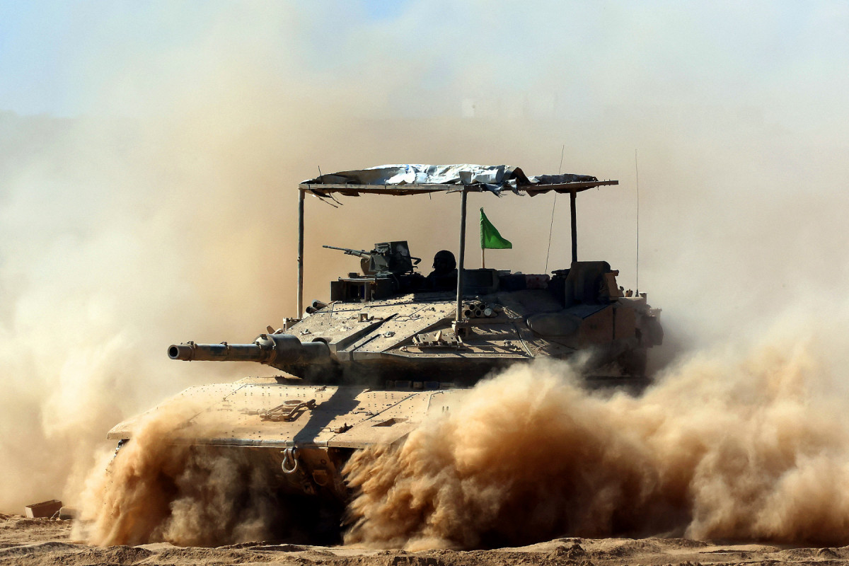 Israeli troops deploy by Israel's border fence with the Gaza Strip on July 10, 2025, amid the ongoing war with the Palestinian militant movement Hamas. (Jack GUEZ / AFP) Israeli troops deploy by Israel's border fence with the Gaza Strip on July 10, 2025, amid the ongoing war with the Palestinian militant movement Hamas. /Jack GUEZ / AFP