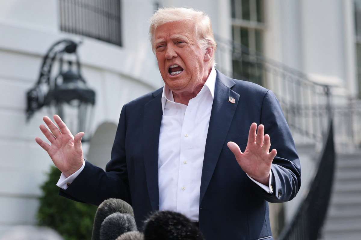  WASHINGTON, DC - JULY 11: U.S. President Donald Trump answers questions while departing the White House on July 11, 2025 in Washington, DC. Trump is scheduled to travel to Central Texas today to meet with first responders and local elected officials involved with the recovery process from last week's flash flooding event that has claimed more than 120 lives.  /WIN MCNAMEE / GETTY IMAGES NORTH AMERICA / Getty Images via AFP