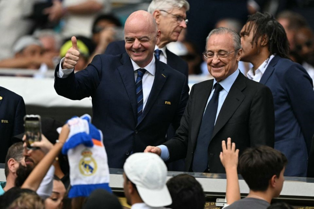 Gianni Infantino, presidente da Fifa, ao lado de Florentino Perez, presidente do Real Madrid (PATRICIA DE MELO MOREIRA / AFP) Gianni Infantino, presidente da Fifa, ao lado de Florentino Perez, presidente do Real Madrid/PATRICIA DE MELO MOREIRA / AFP