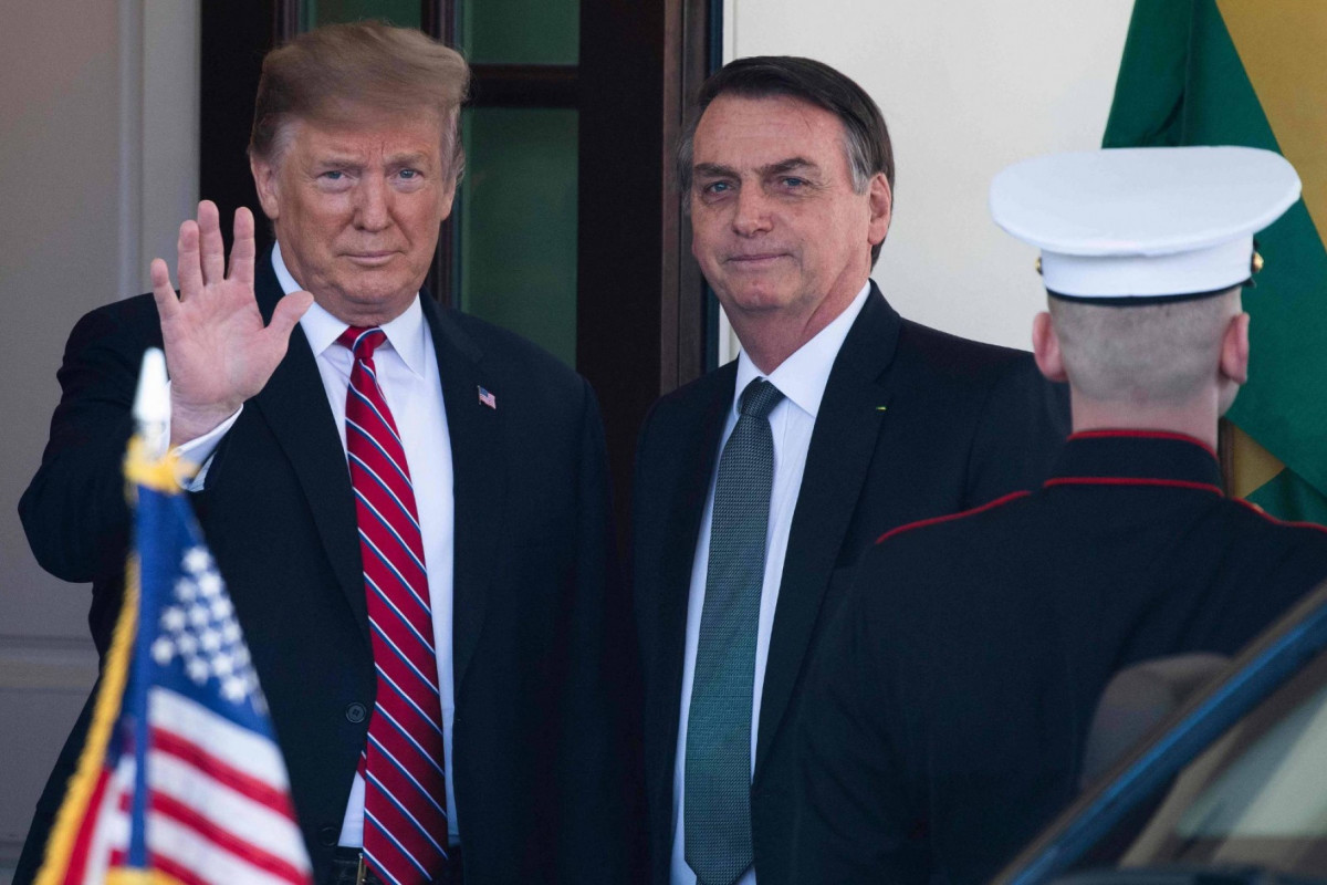 Presidente dos EUA, Donald Trump (à esq.) e o ex-presidente Jair Bolsonaro (à dir.) (AFP) Presidente dos EUA, Donald Trump (à esq.) e o ex-presidente Jair Bolsonaro (à dir.)/AFP
