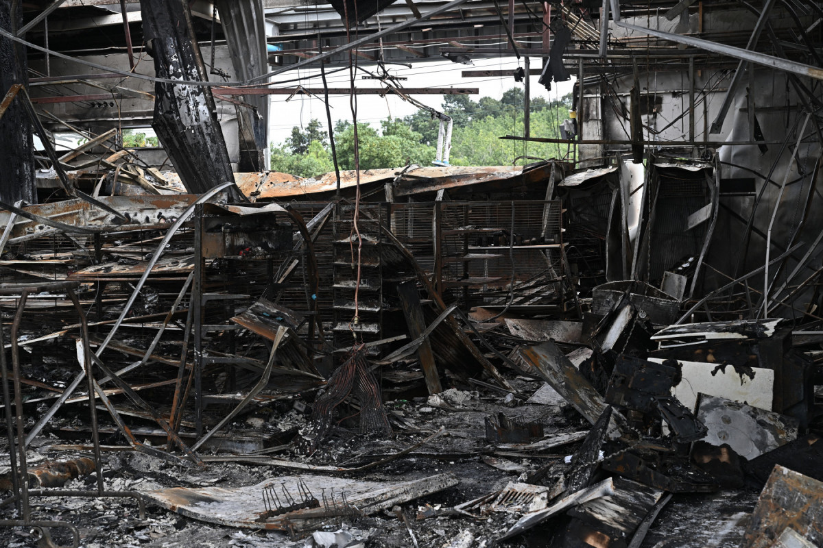  Damage from a fire caused by Cambodian artillery at a 7-11 convenience store is seen at a PTT gas station in the Thai border province of Sisaket province on July 25, 2025. Thailand's acting Prime Minister Phumtham Wechayachai warned July 25 that cross-border clashes with Cambodia that have uprooted more than 130,000 people 