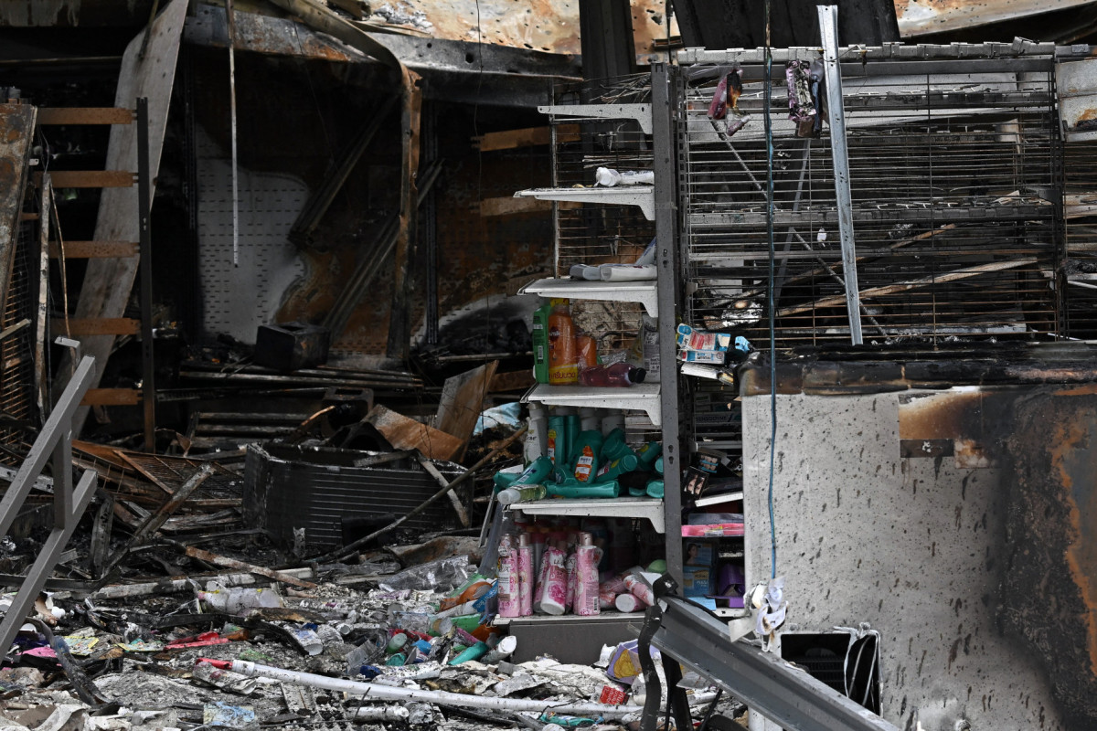 Damage from a fire caused by Cambodian artillery at a 7-11 convenience store is seen at a PTT gas station in the Thai border province of Sisaket province on July 25, 2025. Thailand's acting Prime Minister Phumtham Wechayachai warned July 25 that cross-border clashes with Cambodia that have uprooted more than 130,000 people 