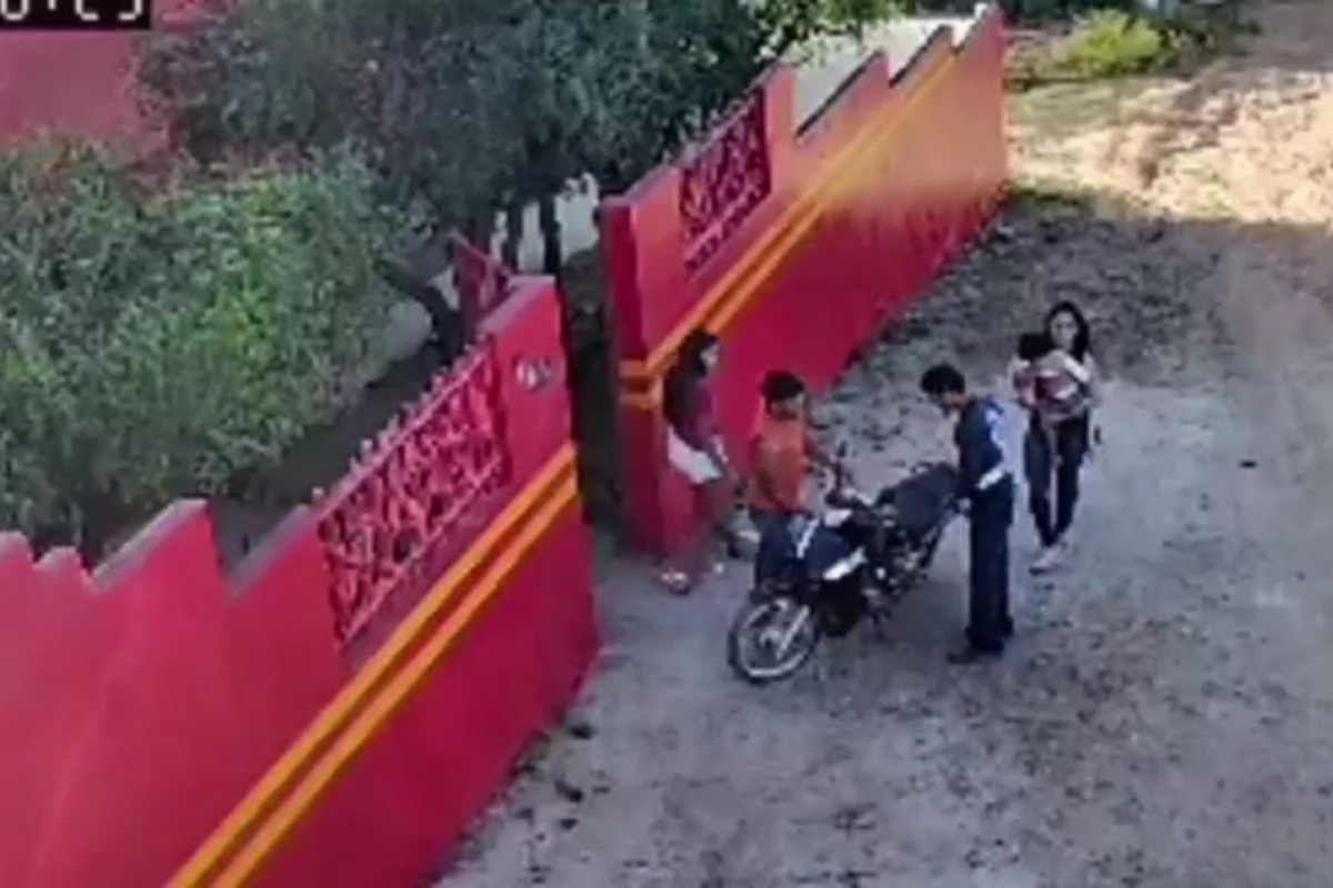 Pai levou criança descordada na moto para o agrupamento