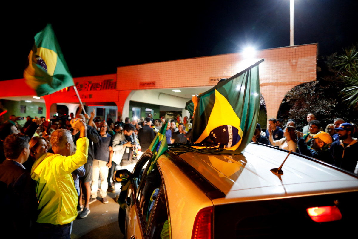 Entrada do condomínio onde mora Jair Bolsonaro, em Brasília (DF)/Sergio LIMA / AFP