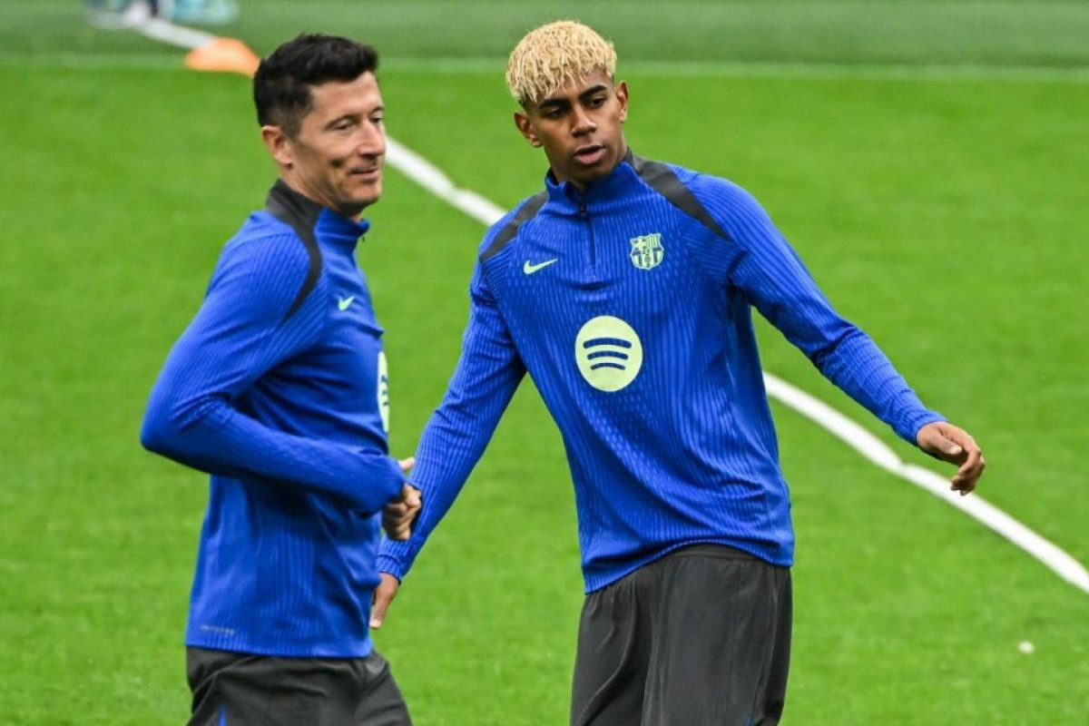 Lamine Yamal e Robert Lewandowski, jogadores do Barcelona (PIERO CRUCIATTI / AFP) Lamine Yamal e Robert Lewandowski, jogadores do Barcelona/PIERO CRUCIATTI / AFP