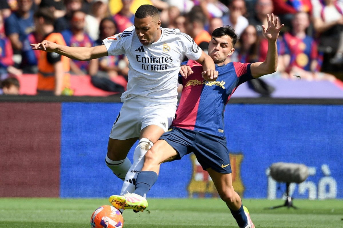 Real Madrid e Barcelona são os favoritos ao título espanhol/JOSEP LAGO / AFP