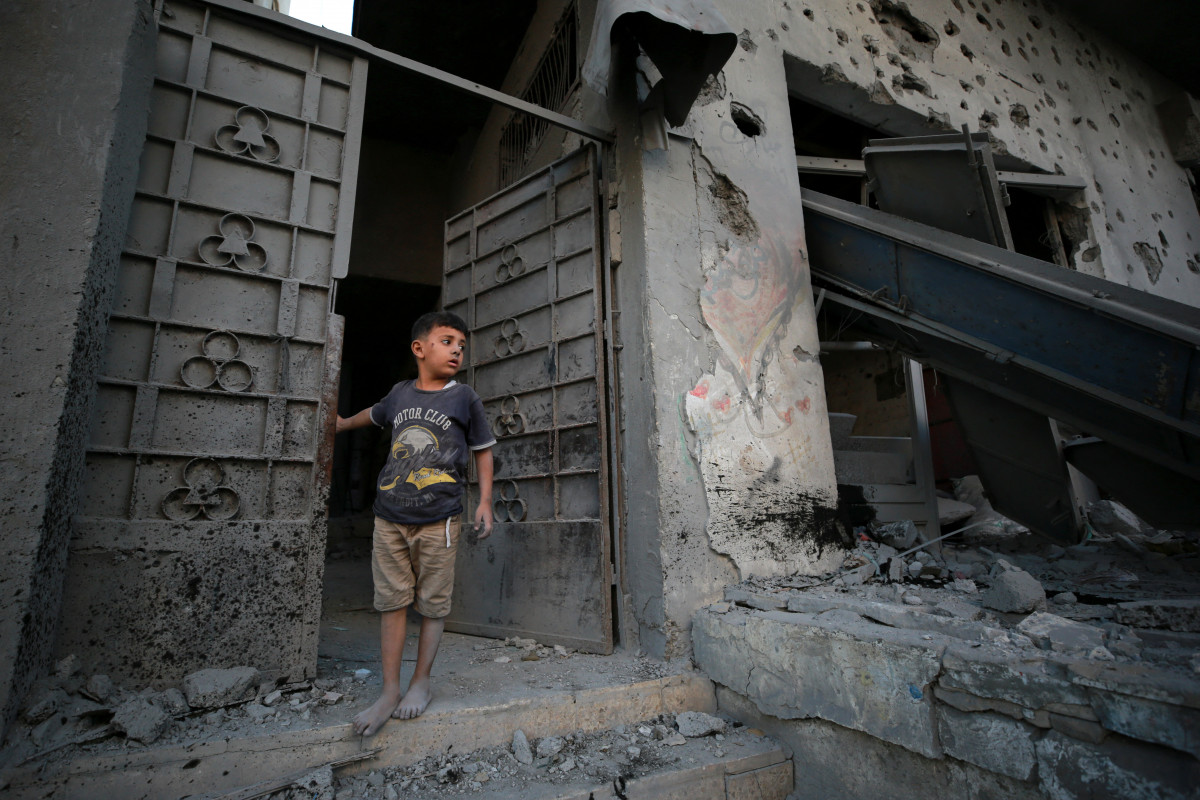 Um menino palestino verifica a destruição em uma área a sudoeste da Cidade de Gaza, atingida por fogo israelense, em 29 de agosto de 2025, enquanto a guerra entre Israel e o movimento militante Hamas continua. O exército israelense declarou a Cidade de Gaza Um menino palestino verifica a destruição em uma área a sudoeste da Cidade de Gaza, atingida por fogo israelense, em 29 de agosto de 2025, enquanto a guerra entre Israel e o movimento militante Hamas continua. O exército israelense declarou a Cidade de Gaza