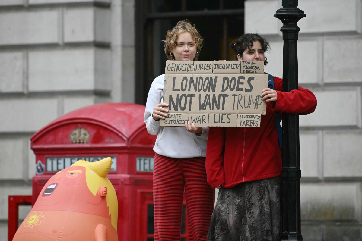 Milhares de manifestantes protestam em Londres contra visita de Trump/ JUSTIN TALLIS / AFP