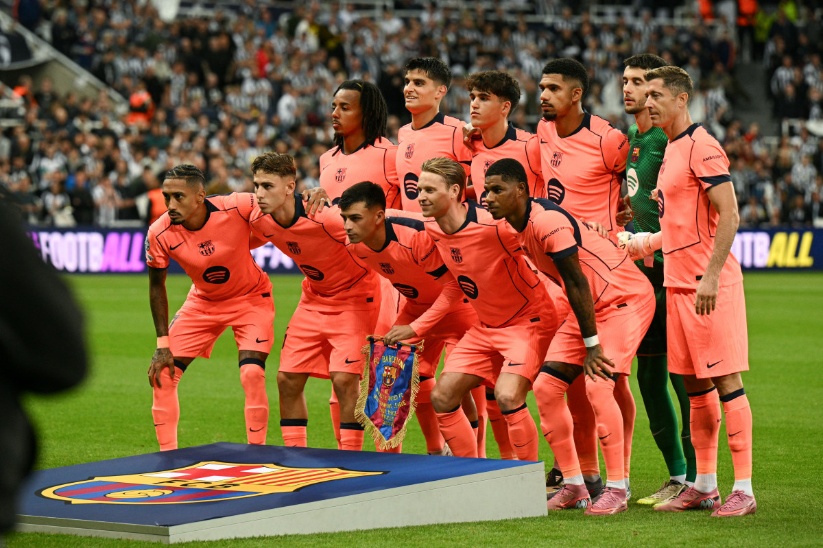 Equipe do Barcelona em jogo da UEFA Champions League (OLI SCARFF / AFP) Equipe do Barcelona em jogo da UEFA Champions League/OLI SCARFF / AFP