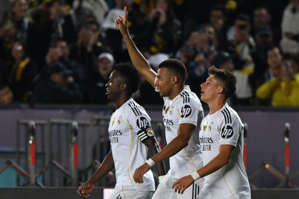 Elenco do Real Madrid em comemoração de gol pela Liga dos Campeões/VYACHESLAV OSELEDKO / AFP