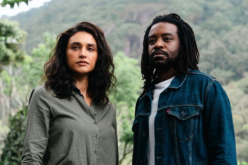 Débora Nascimento e Fabrício Boliveira interpretam ex-casal de detetives que precisa se unir para descobrir a verdade sobre o crime (Foto: Théo Doré) Débora Nascimento e Fabrício Boliveira interpretam ex-casal de detetives que precisa se unir para descobrir a verdade sobre o crime/Foto: Théo Doré