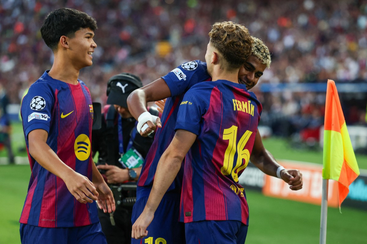 Equipe do Barcelona em comemoração de gol na Champions League (Josep LAGO/AFP) Equipe do Barcelona em comemoração de gol na Champions League/Josep LAGO/AFP