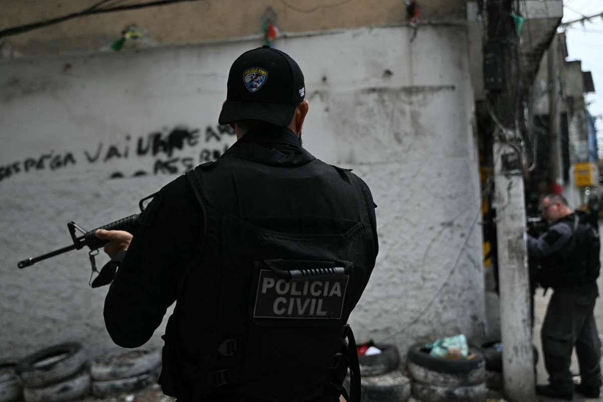 Policiais durante a Operação Contenção na favela Vila Cruzeiro, no complexo da Penha, no Rio de Janeiro ( MAURO PIMENTEL / AFP) Policiais durante a Operação Contenção na favela Vila Cruzeiro, no complexo da Penha, no Rio de Janeiro/ MAURO PIMENTEL / AFP