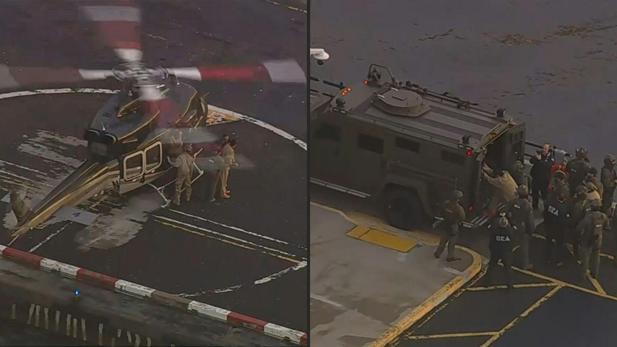 Presidente da Venezuela, Nicolás Maduro, sendo levado ao tribunal por agentes de segurança dos EUA/ARON RANEN / various sources / AFP