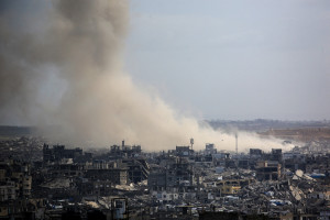  Plumes of smoke rise after the Israeli army carried out house demolitions east of Jabalia, in the northern Palestinian Gaza Strip, on January 10, 2026. The majority of Gaza's 2.4 million people have been displaced, often multiple times, by the war that began with Hamas's attack on southern Israel on October 7, 2023. With displaced families living in tented camps, a serious concerns has been raised over their living conditions. (Photo by Bashar TALEB / AFP)