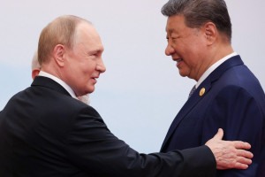 O presidente russo, Vladimir Putin e o l&iacute;der chin&ecirc;s Xi Jinping 