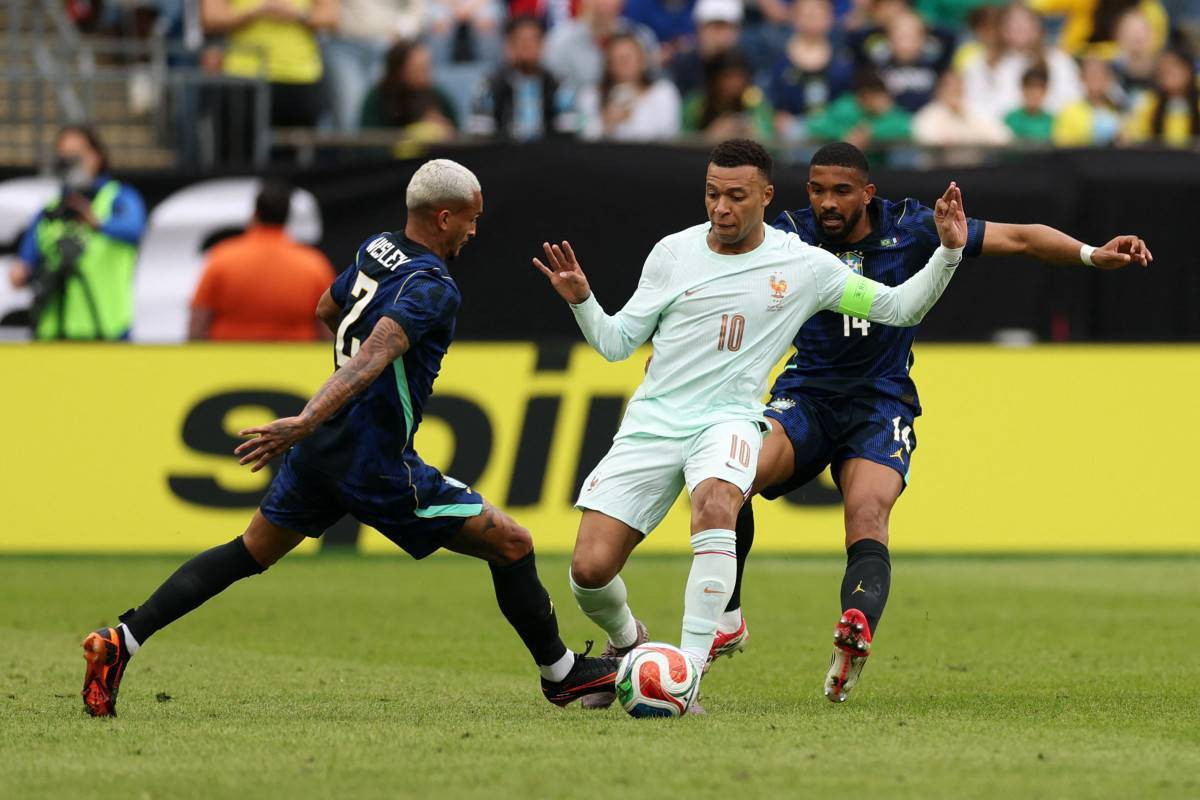 Wesley, Mbappé e Bremer em ação no amistoso entre Brasil e França, em Boston/Maddie Meyer / GETTY IMAGES NORTH AMERICA / Getty Images via AFP