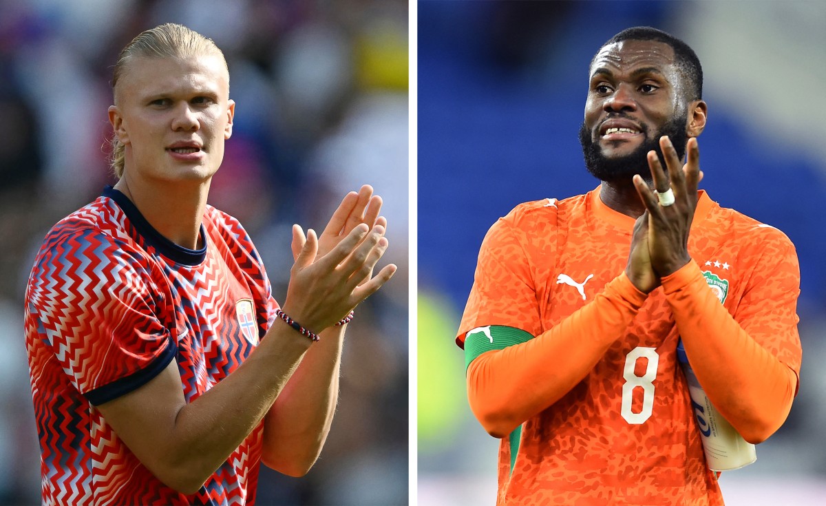  Erling Haaland, da Noruega, e Franck Kessie, da Costa do Marfim /Mauro PIMENTEL and Peter POWELL / AFP