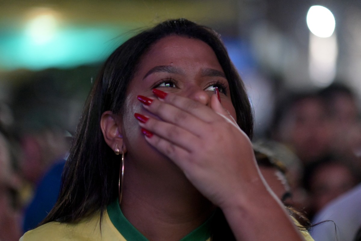 Tristeza tomou conta da torcida do Brasil/TERCIO TEIXEIRA / AFP
