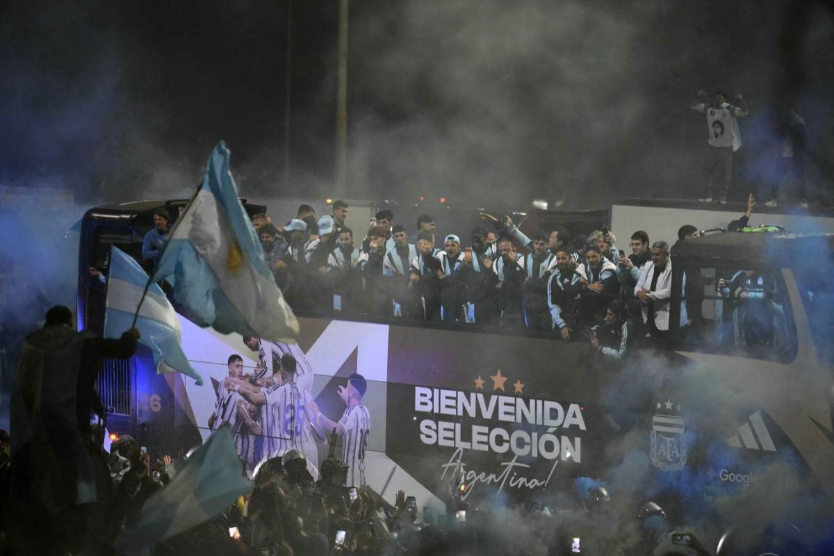 Seleção da Argentina em Buenos Aires ao retornar dos Estados Unidos/Luis ROBAYO / AFP