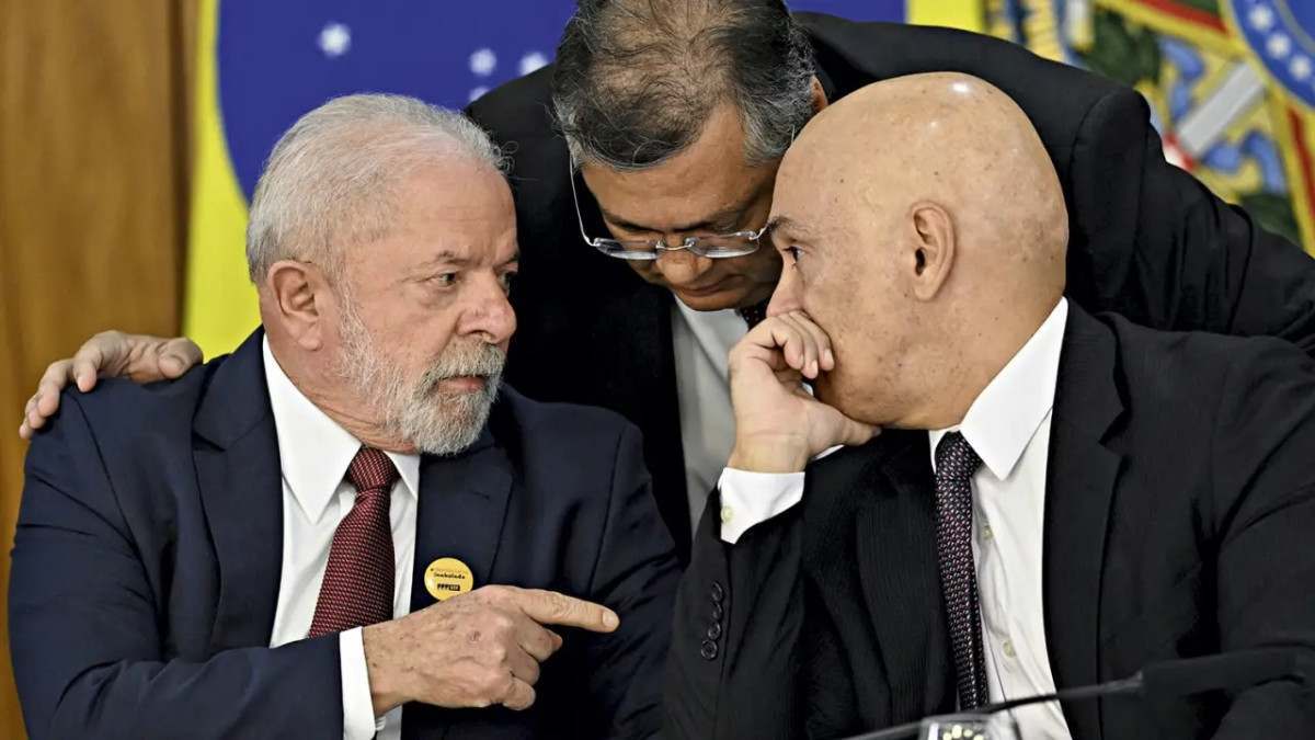 Lula, Flávio Dino e Moraes/Evaristo Sa/AFP