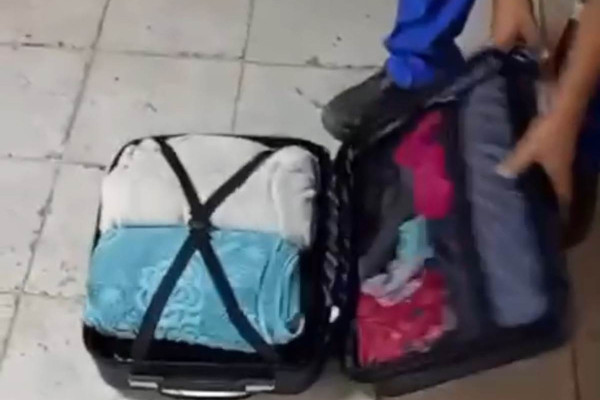 Droga estava escondida em mala (Foto: PMPE/Divulgação)