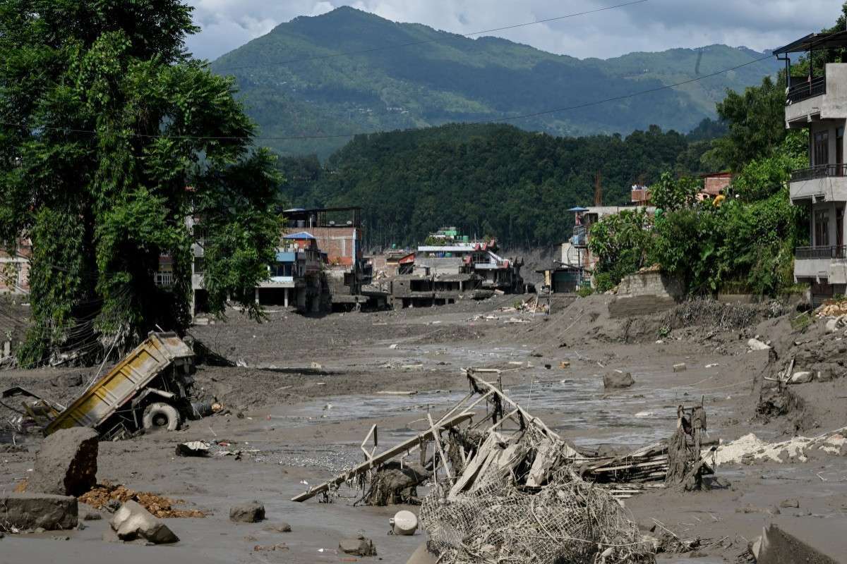  Desastre atingiu uma região da fronteira entre o Nepal e a China/Prakash Mathema/AFP