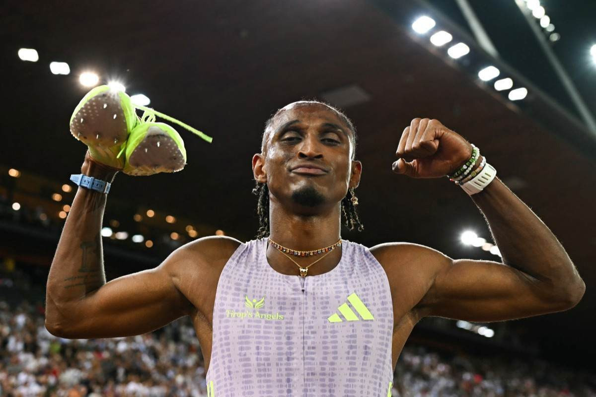 Alison dos Santos/Fabrice COFFRINI / AFP