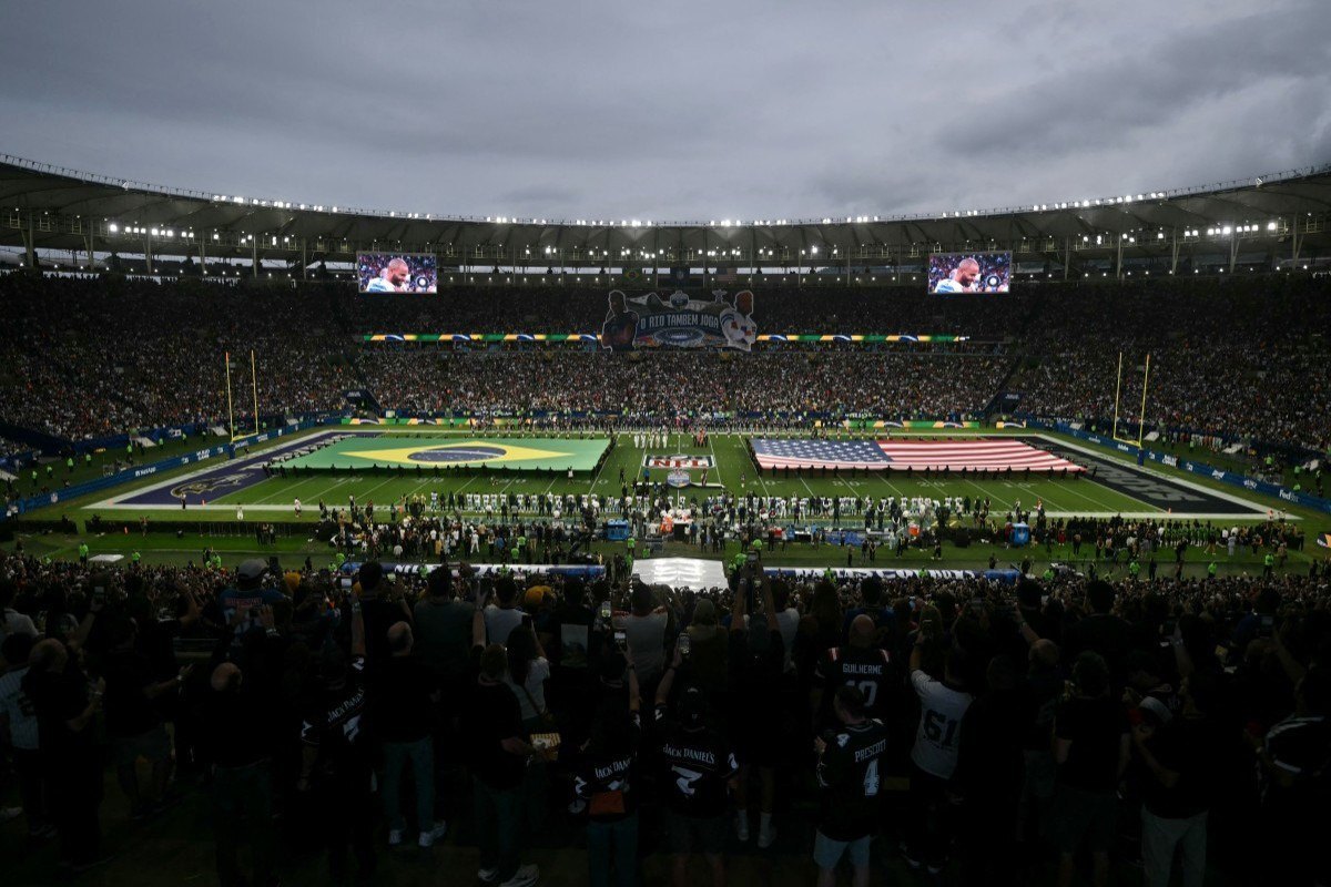  Giant Brazilian and US flags are being displayed at the pitch ahead of the NFL match between the Dallas Cowboys and the Baltimore Ravens at the Maracana Stadium in Rio de Janeiro, Brazil, on September 27, 2026. (Photo by MAURO PIMENTEL / AFP)/MAURO PIMENTEL/AFP