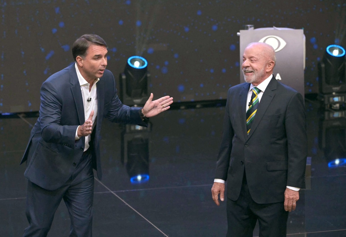 Lula questiona sobre SUS; Fl&aacute;vio faz mea culpa sobre sa&uacute;de no governo Jair Bolsonaro -  Foto: NELSON ALMEIDA/AFP