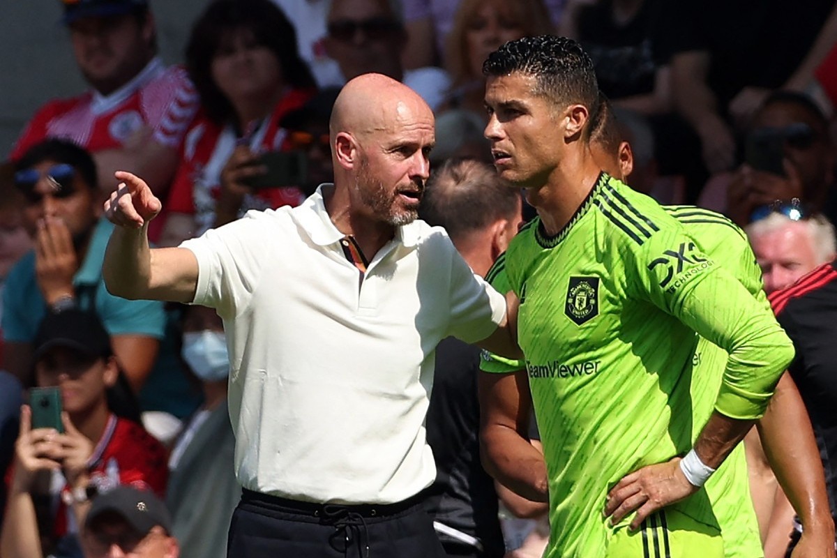 Erik Ten Hag e Cristiano Ronaldo em tempos de Manchester United/ADRIAN DENNIS / AFP