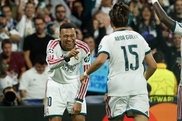 Com Vini Jr. titular e Endrick s&oacute; no fim, Real Madrid faz quatro no Leipzig pela Champions - OSCAR DEL POZO / AFP