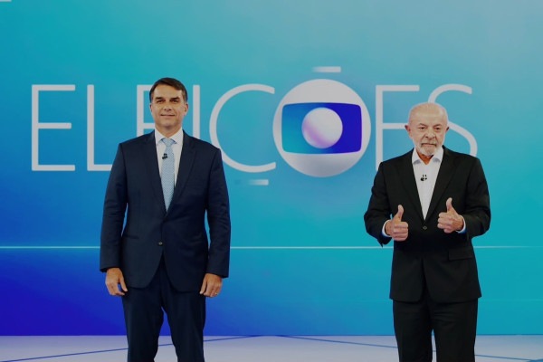 Fl&aacute;vio Bolsonaro e Lula em debate na TV Globo