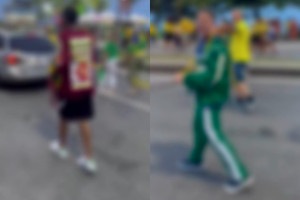 Homem acorrentado durante ato em apoio a Fl&aacute;vio Bolsonaro
