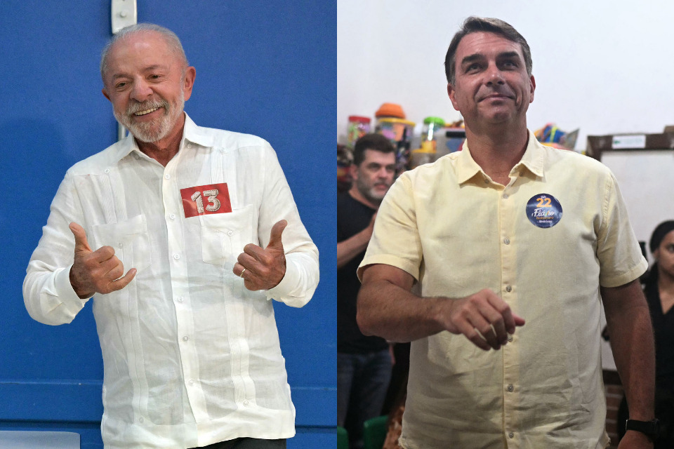 Candidatos à presidência Luiz Inácio Lula da Silva (PT) e Flávio Bolsonaro (PL)/NELSON ALMEIDA/AFP e MAURO PIMENTEL / AFP