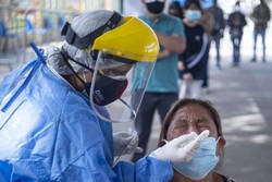 Covid-19: Brasil registra 2º maior número de casos diários desde o início da pandemia (Foto: Ernesto BENAVIDES / AFP)