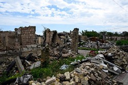 Bucha, cidade ucraniana devastada, da vitória à reconstrução  (Foto: MIGUEL MEDINA / AFP)