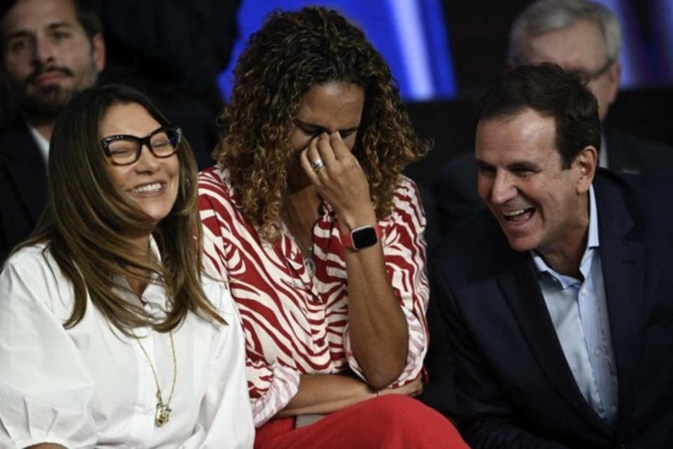Na primeira fila, Janja e Anielle riem de comentrio feito por Paes na cerimnia que lanou o Impa Tech  (Crdito: Mauro Pimentel/AFP)