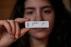 China indica EUA como a possvel origem da Covid-19 (Foto: Louisa Gouliamaki/AFP)