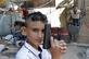 Uma criana de refugiado srio posa para uma foto com uma arma no campo de refugiados palestinos de Shatila, nos subrbios do sul da capital libanesa Beirute. Foto: ANWAR AMRO/ AFP Photo. - 