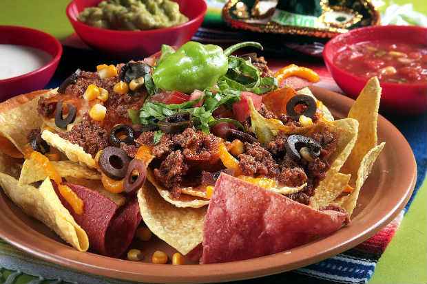 Prato Carlos Santana, feito de nachos com Picadillo,  um dos sucessos entre os pratos salgados. Foto: Escalantes/Divulgao